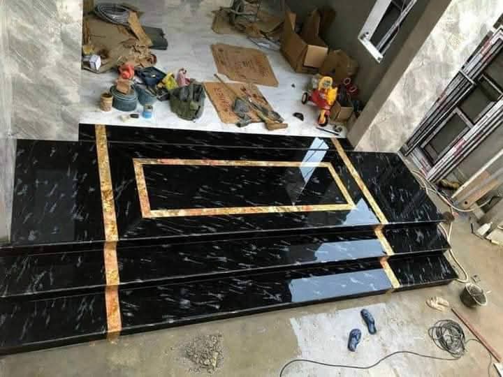 Custom Nero Marquina Entrance Treads with Gold Inlay