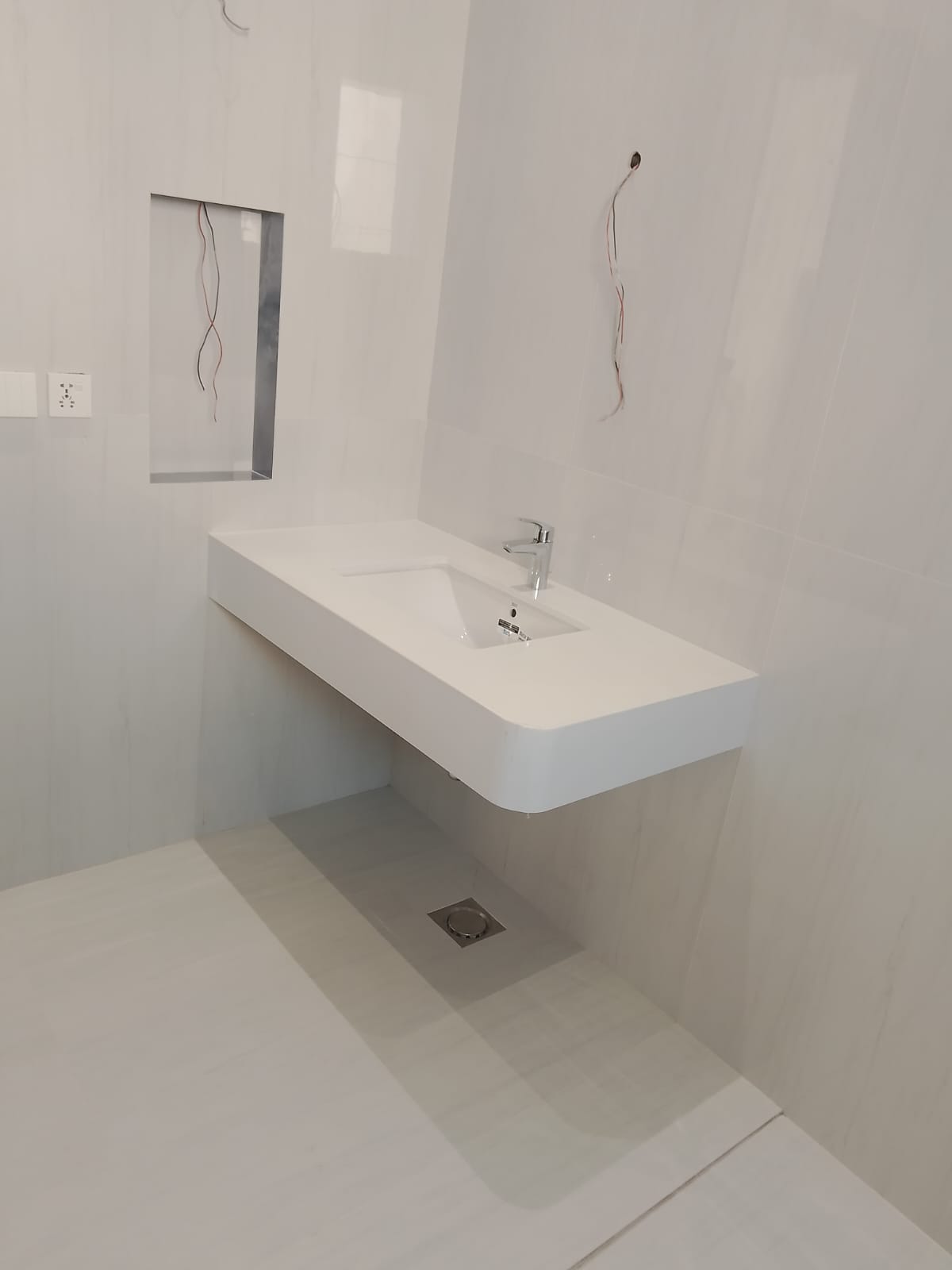 Custom Floating Slab Vanity & Wall Outlet Alignment
